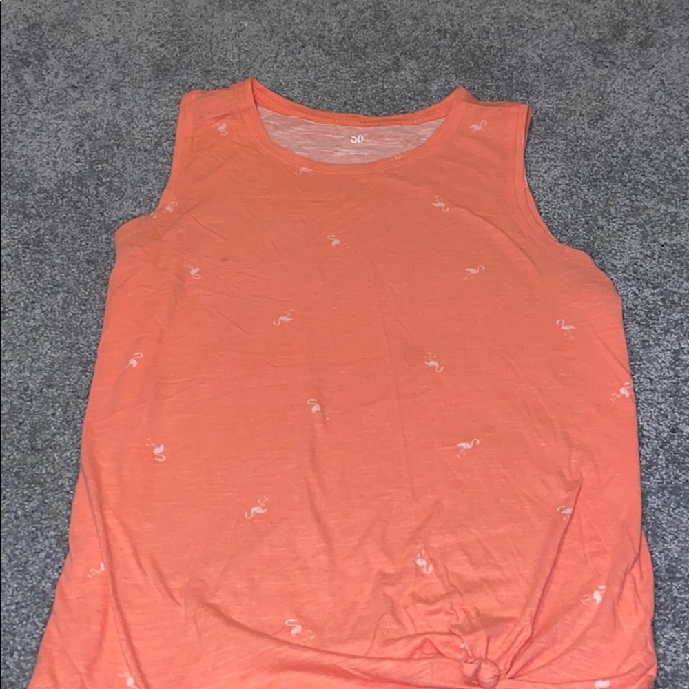 Tank top with flamingos on it